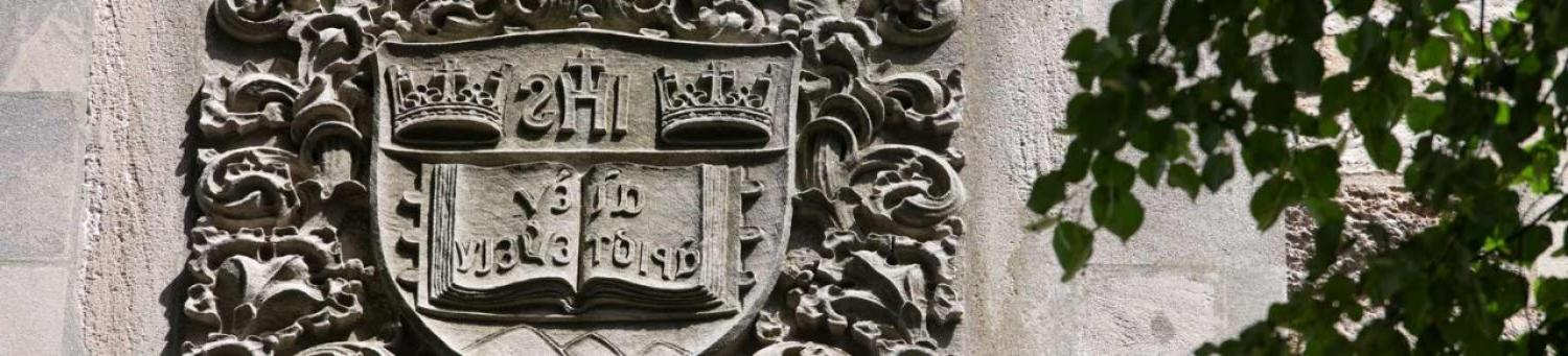 Sculptural relief of BC's shield on Bapst Library's exterior.